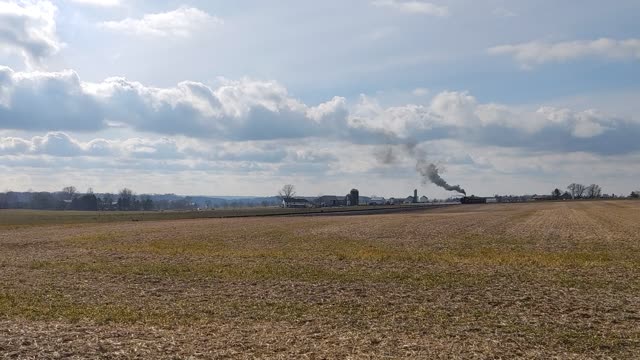 Strasburg Railroad train passing crossing