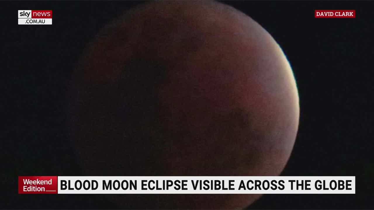 Blood moon lights up the sky in longest partial eclipse in 600 years