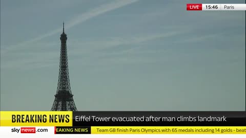 Eiffel Tower evacuated after shirtless man climbs landmark