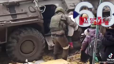 Children being evacuated in personal armored vehicle in Donetsk