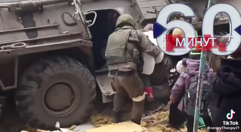 Children being evacuated in personal armored vehicle in Donetsk