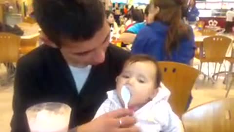 Baby eating ideas cream with buddy