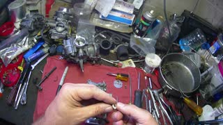 Replacing throttle shaft seals in Honda V4 motorcycle carburetors