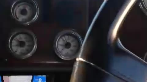 Truck driver watching cartoons while driving