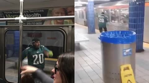 Synced videos of the Eagles fan running into the pillar