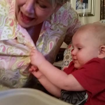 Baby Boy Peeks Down Grandma's Blouse And Has "Wow" Reaction