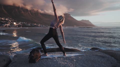 Doing Yoga On Seashore