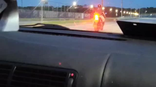 Biker Does A Wheelie