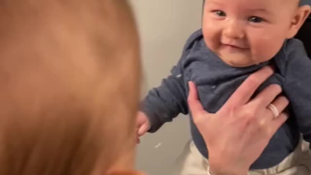 Adorable footage shows toddler's first encounter with a mirror