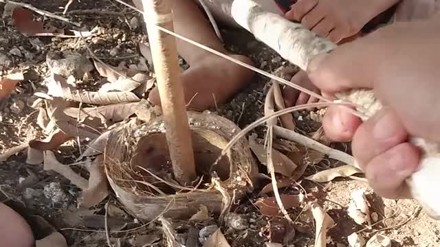 How To Start a Fire With Two Sticks and Fishing Line