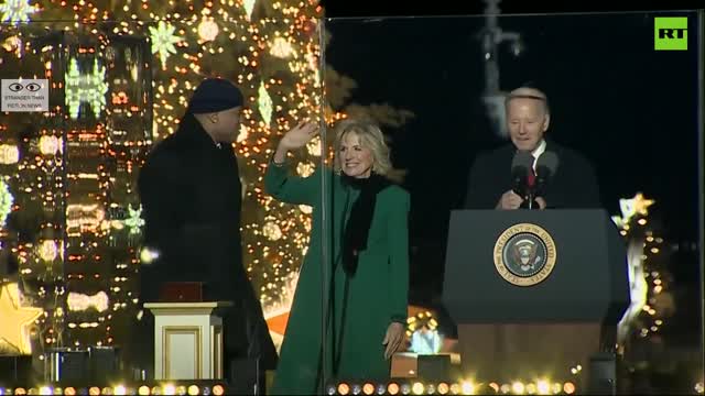 Biden Leaves Stage Still Holding Mic as if He Has More to Say to the World!