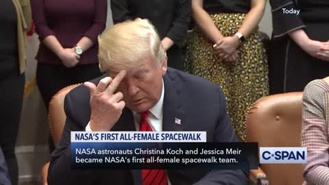 Trump female space walk GIVES EM THE FINGER