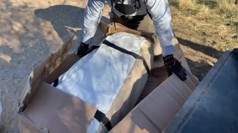 Unpacking, white Duck tent