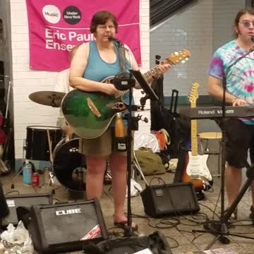 Family band subway performance guitar music