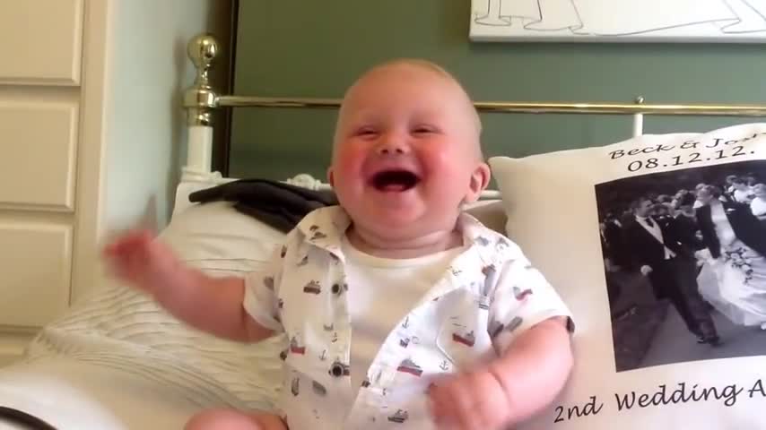 little boy laughing