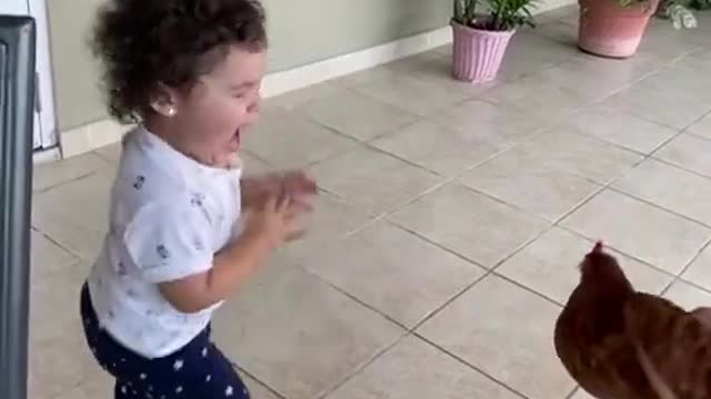 BABY GIRL SCARED OF CHICKEN