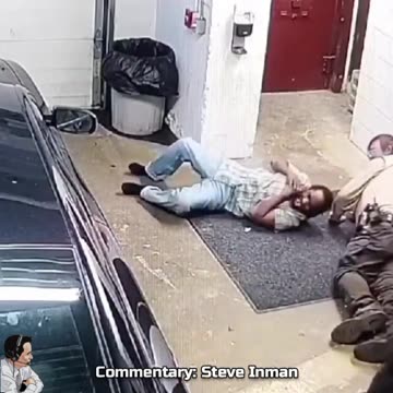 Inmate grabs an officer's gun just before being transported from jail to court