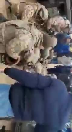 Kazakhstan - Ukraine soldiers being arrested by the people