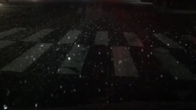 a snowy night in the car