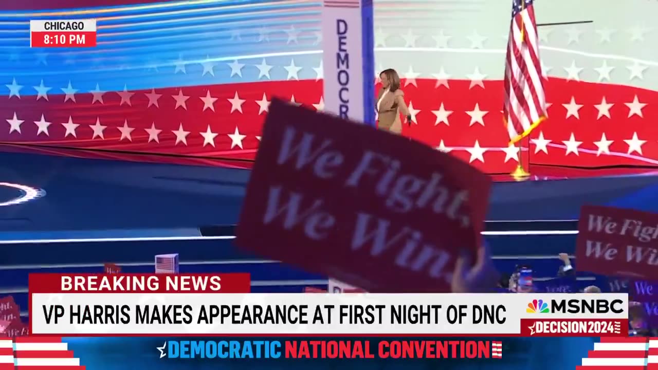 VP Kamala Harris makes a surprise appearance on stage at the first night of the DNC