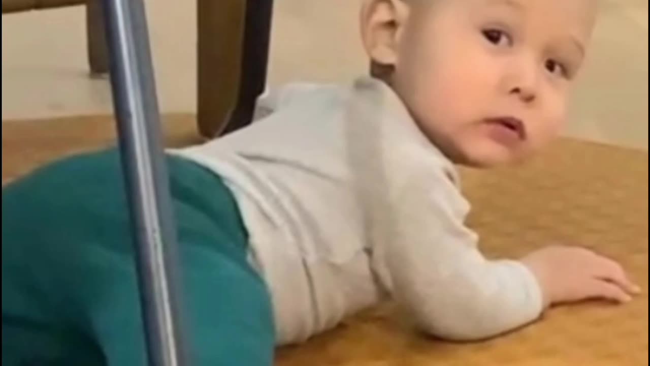 Baby laughs