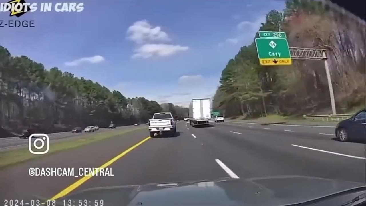 Road rage, 2 pickup trucks pass on shoulder, doesn't end well. Instant Karma