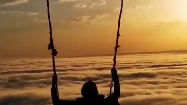 Swinging above the clouds 😊 Who wants to swing here?