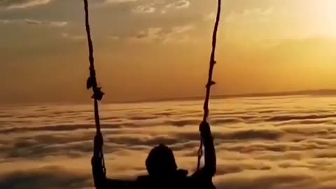 Swinging above the clouds 😊 Who wants to swing here?