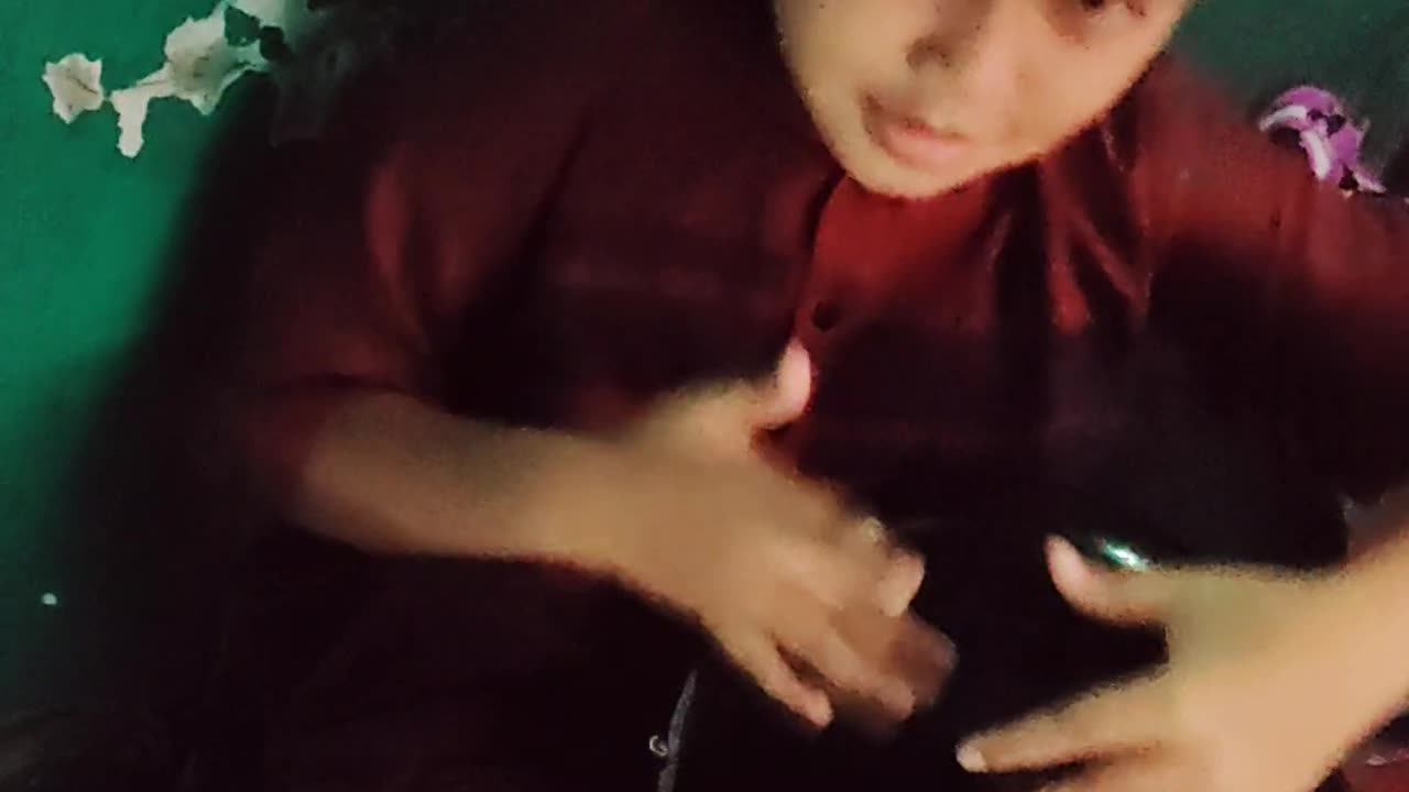 Little boy playing darbuka