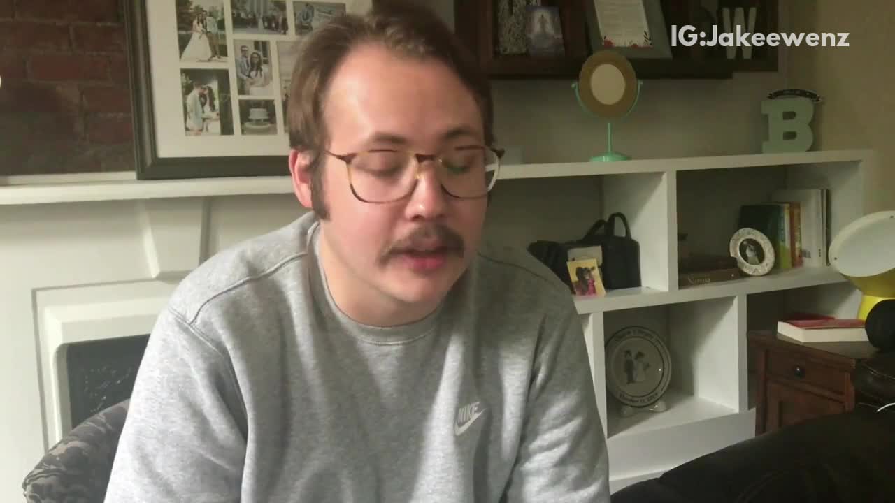 Glasses mustache guy messes with scammer on telephone