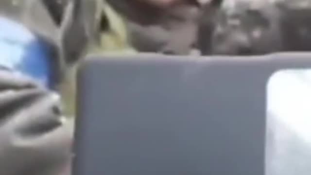 Ukrainian soldier saved by cell phone