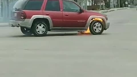 Dude Drives Off in Flaming Vehicle