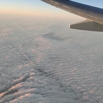 Sunset over clouds