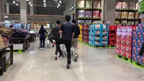 3 men shopping