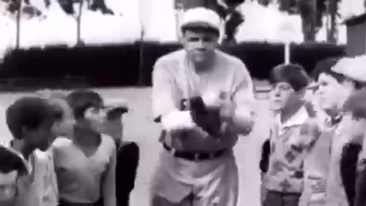 Babe Ruth teaching kids how to throw a curve and a knuckleball