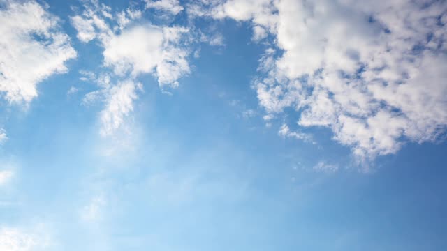 Beautiful Blue Sky And White Clouds Under The Hot Sun