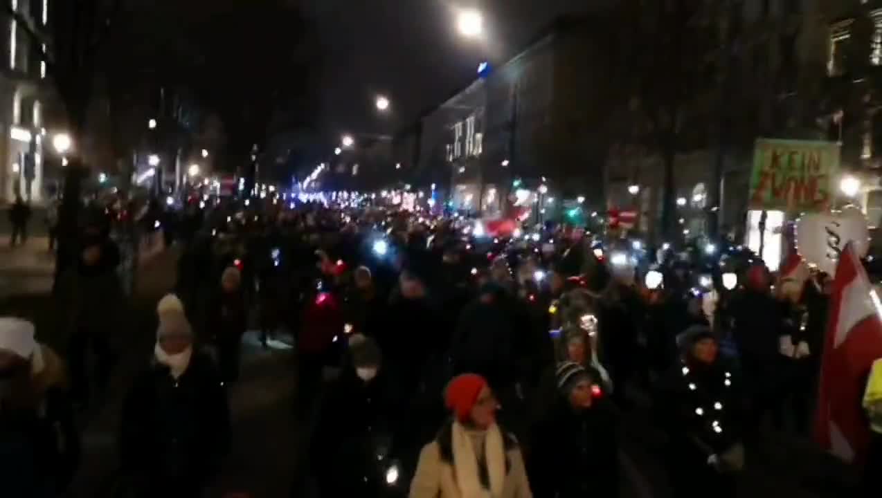 Vienna Austrian walk the streets, playing we are the One's we are the children in the background