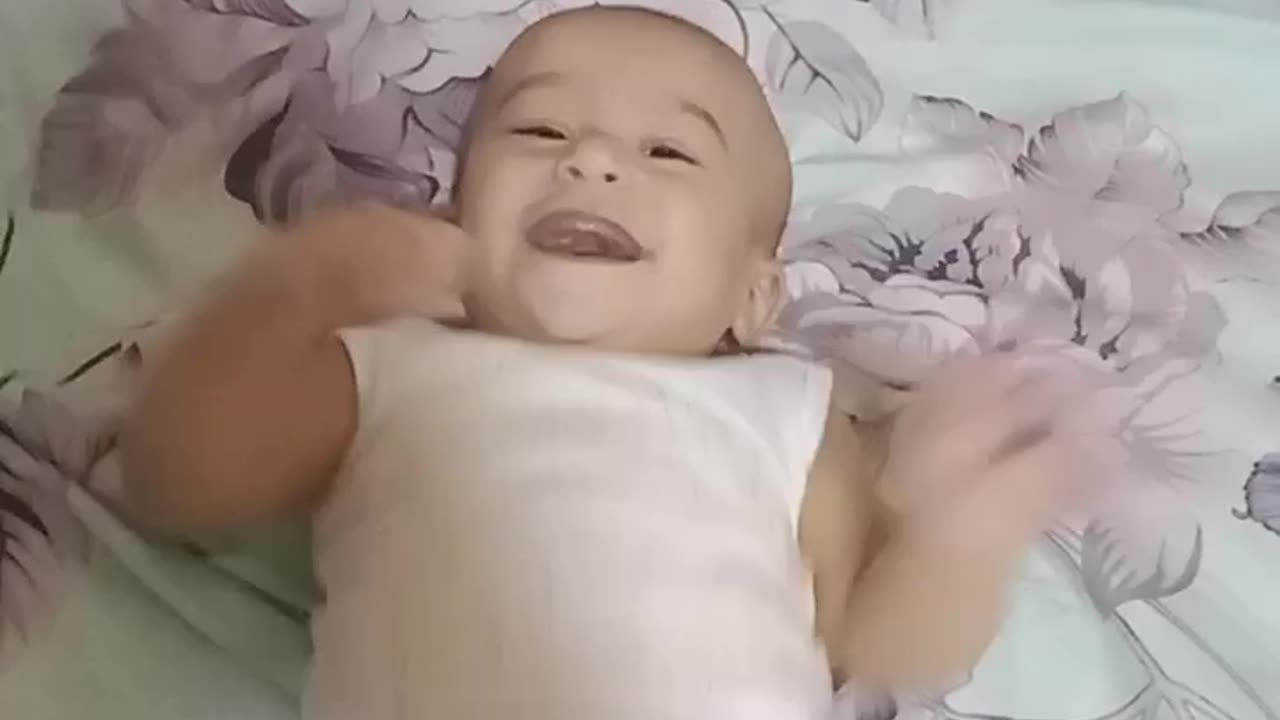 Cute baby laughing