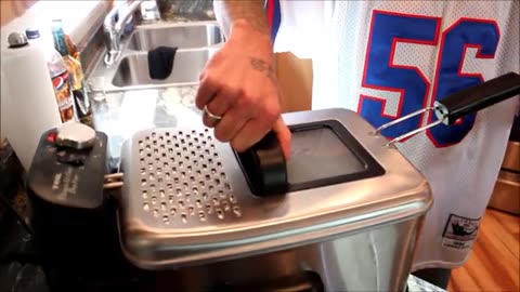 Egg cracked into full blast deep fryer