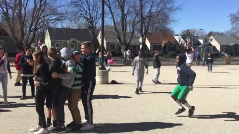 Five student jump faceplant