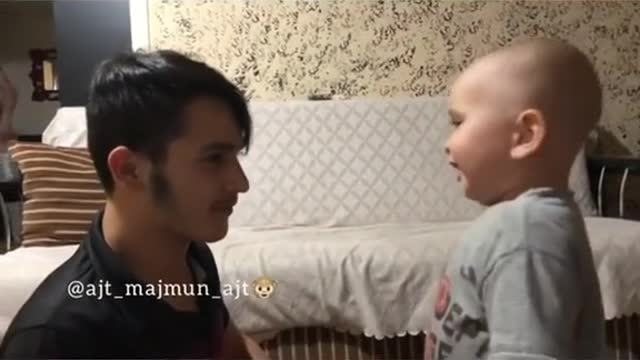 Try not to laugh with this funny baby