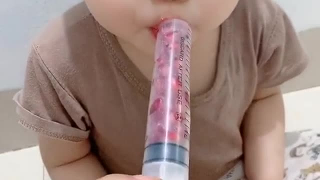 Nice and easy way to feed the baby fresh pomegranate