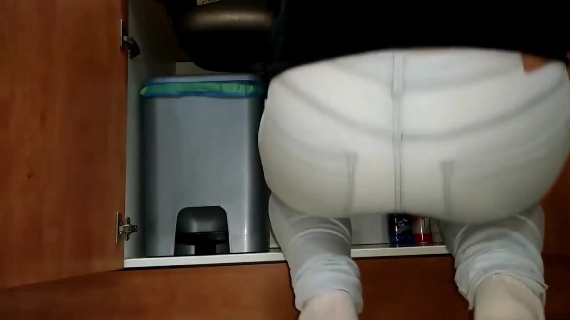 Blue Thong Cleaning Under Sink