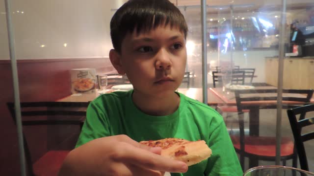 Eating a pizza