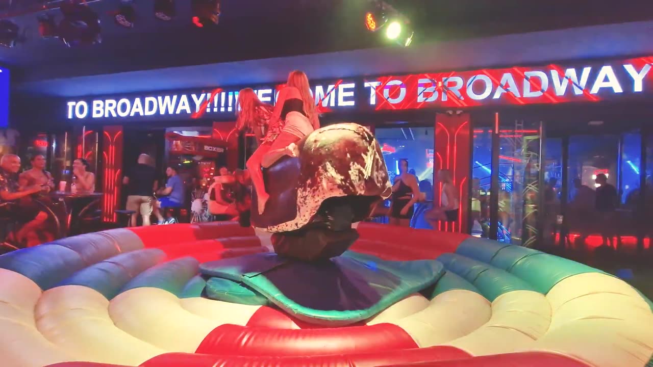 GIRL TAKE ON THE BULL! Benidorm Bull Ride. Mechanical Bull EPIC FAIL