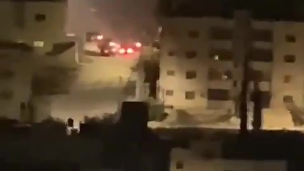 A bomb explosion with a military vehicle in the Jabariat neighborhood in the city