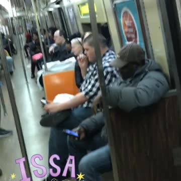 Issa party man sparks joint on subway