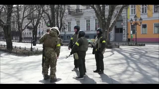 Ukrainians try to shield statues and monuments from Russian shelling to protect heritage