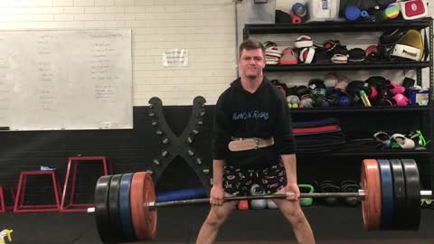 180kg/405lb deadlift at 15 (69kg bodyweight)