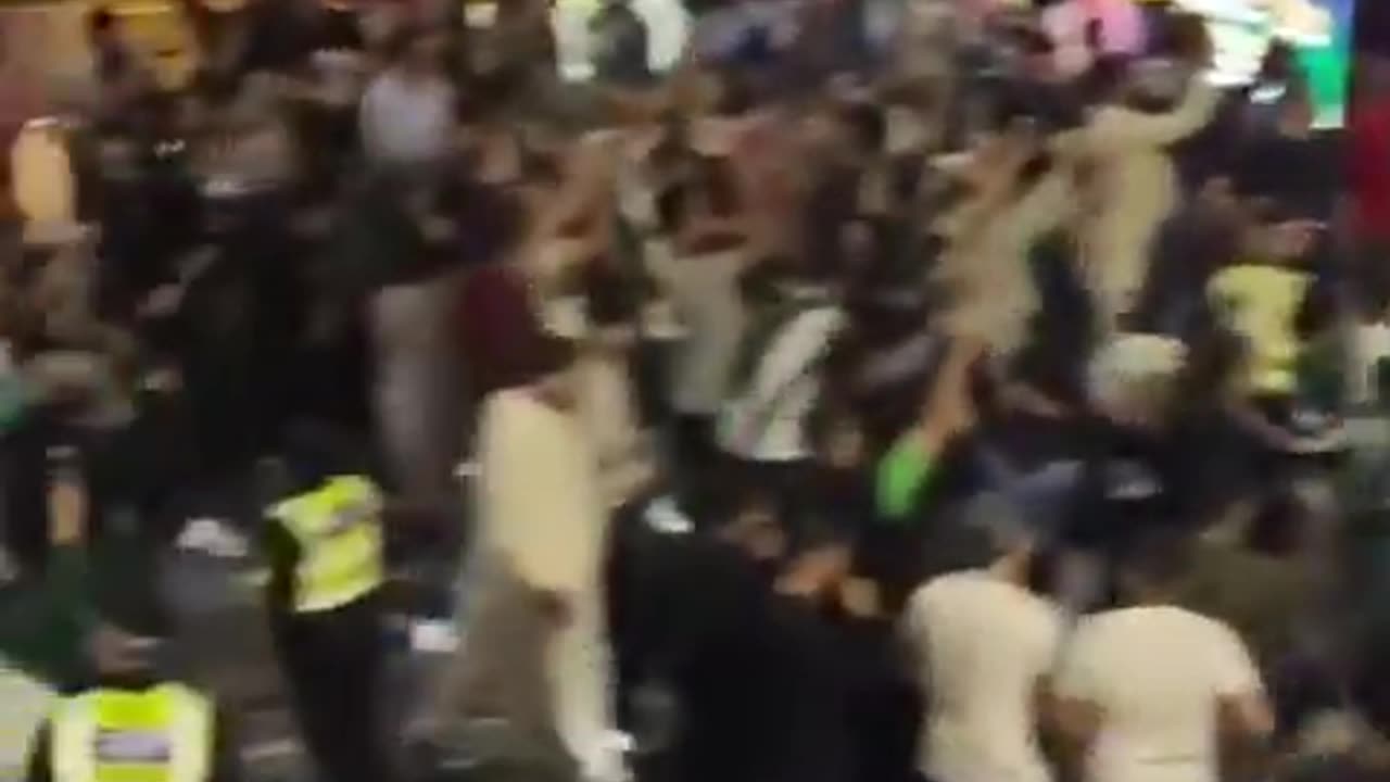 jewK ZOBbots dancing with feral invaders imported by jews in Manchester